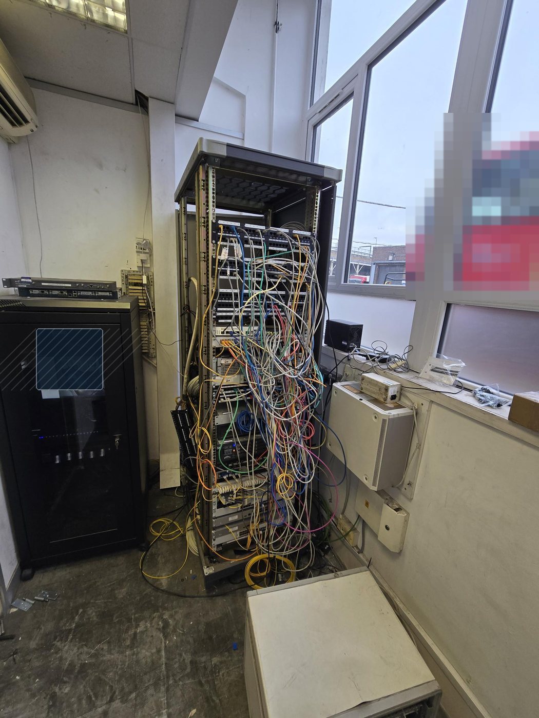 Network and CCTV cabinet before rebuild